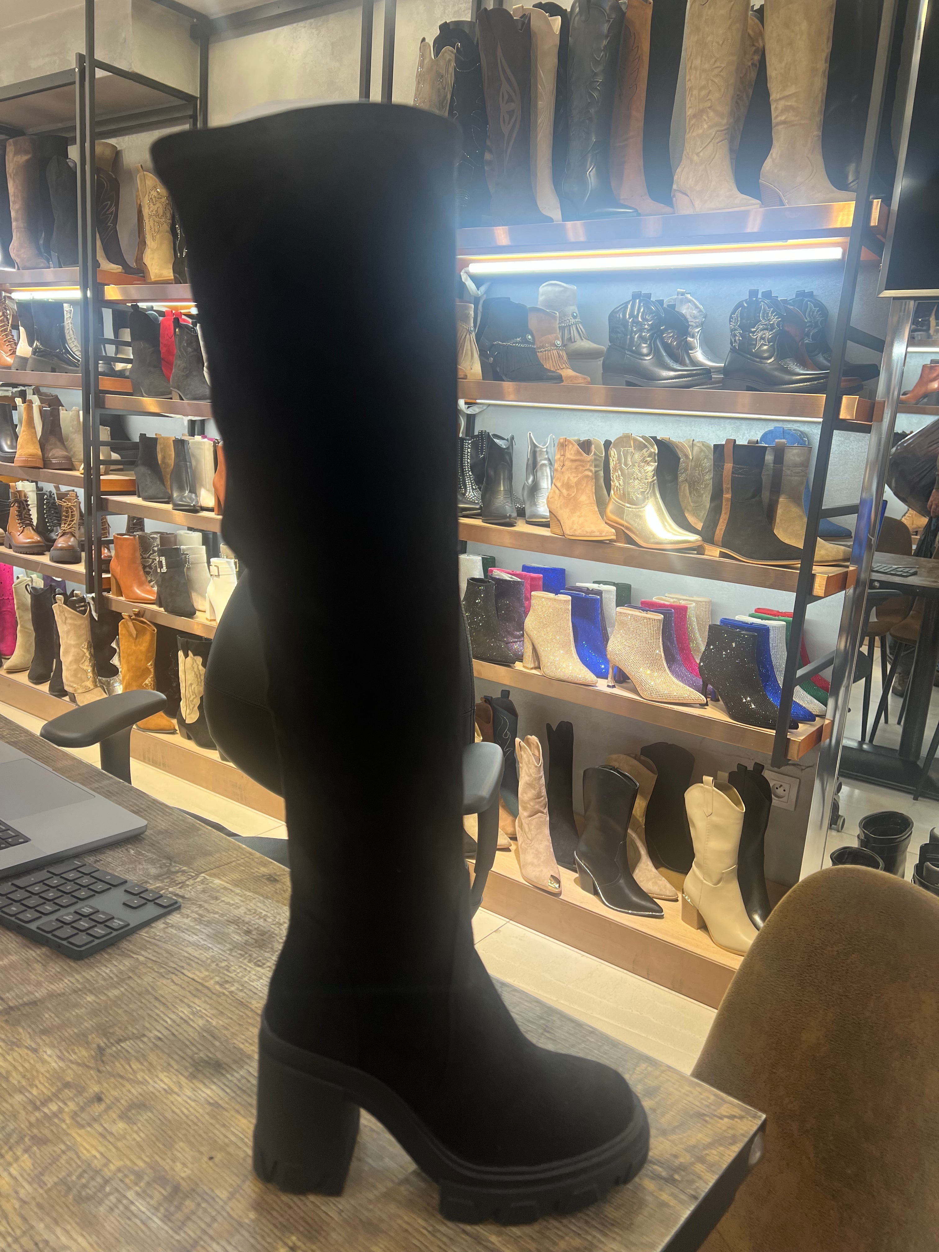 Our black suede over the knee heeled boots